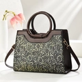 Borsa retrò in pelle marrone scuro con goffratura floreale dorata e manici tondi - Oro Chiaro