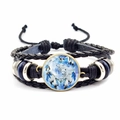 Macro detail of multi-layer leather bracelet with wolf totem and dreamcatcher glass gem - Double White Wolves and Dreamcatcher (JY00329-5)