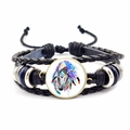 Detailed view of multilayer woven bracelet with unicorn glass gem and adjustable cord - Colorful Unicorn and Feathers (JY00329-7)