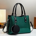 Close-up of dark green glitter crossbody bag with black patent leather and mini pouch - Dark Green