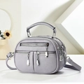 Chic multi-pocket lilac faux leather camera bag with silver zippers and top handle - Light Purple