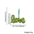 Pendaglio Love con trifoglio verde e oro per decorazione festa San Patrizio - Ciondolo Trifoglio Love / Il Ciondolo Con La Lettera "love" Presenta Una Base In Feltro Verde Con Paillettes Dorate E Incorpora Elementi A Forma Di Trifoglio.