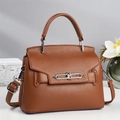 Brown lychee texture pillow bag with silver hardware and shoulder strap in high-end style - Earthy Yellow