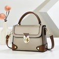 Elegant trapezoidal box bag in beige and brown leather with gold hardware and top handle - Dark Khaki