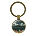 Detailed view of bronze teacher gift keychain with glass pendant and book illustration - Thank You Quote With Books (JY00501-7)