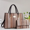 Detail of woven tote bag and matching wallet with vertical textured stripes and metal logo - Brown