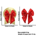 Fiocco natalizio con paillettes rosse e supporto dorato per decorazione regalo - Rosso