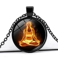 Detail of artistic yoga meditation pendant with glowing orange fire figure on black chain - Flame Radiance Meditation (JY00959-2)