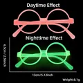 Gafas de huevo de Pascua rosa con efecto neón verde brillante en oscuridad - Marco Redondo Rosa Claro