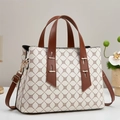 Chic white monogram tote bag with brown handles and adjustable crossbody strap - Ochre and White