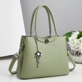 Light green lychee texture tote bag with floral pendant and adjustable crossbody strap - Green