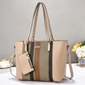 Detail of a beige tote bag featuring vertical contrast stripes and a small hanging pouch - Khaki