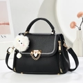 Fashionable black pebbled leather crossbody bag with white embroidery and plush charm - L22xH17xW12 / Black