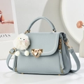 Gray-blue leather handbag with gold twist lock and white plush pompom charm - L22xH17xW12 / Blue