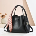 Vintage black bucket bag with lychee texture and decorative silk scarf handles - Black