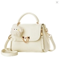 Off-white lychee texture tote with gold hardware and a cute furry monster charm - L22xH17xW12 / Off White