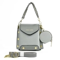 Detail of grey crocodile texture bag with round coin purse and woven handle - Gray