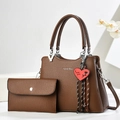 Brown litchi grain leather tote bag set with heart charm on minimalist white background - Tote Bag And Wallet / Coffee