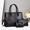 Three-piece black crocodile embossed handbag set with gold hardware and tote strap - Black