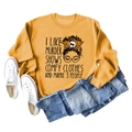 Flat lay of yellow crewneck sweatshirt with 'I LIKE MURDER SHOWS' graphic design - Yellow