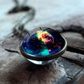 Macro detail of bronze nebula glass ball pendant with vibrant galaxy colors on wood - Aurora Starry Sky Style (JY001624-4)