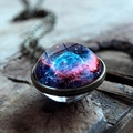 Macro detail of galaxy glass ball pendant with nebula pattern and bronze metal frame - Deep Blue Rose Red Nebula Style (JY001624-11)