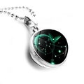 Macro shot of silver Sagittarius constellation glass ball pendant on beaded chain - Silver-Sagittarius