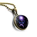 Close-up of bronze Libra zodiac pendant with double-sided glass galaxy star pattern - Bronze-Libra