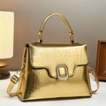 Chic gold crocodile pattern crossbody bag with metallic finish and top handle - Gold