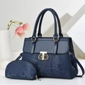 Navy blue snakeskin texture tote bag with matching coin purse and gold clasp detail - Blue
