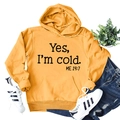 Detail of ginger yellow hoodie with black slogan print and ribbed sleeve cuffs - Ginger Yellow