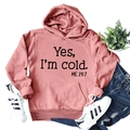 Dusty pink hoodie with Yes I'm Cold slogan paired with jeans and white sneakers - S / Dusty Pink