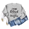 Detail shot of a grey crewneck sweatshirt with Grandma typography and heart pattern print - S / Gray