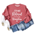 Flat lay of red crewneck sweatshirt featuring white grandma slogan with denim jeans - S / Red (White Font)