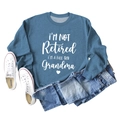 Flat lay of blue grandma slogan sweatshirt with denim jeans and white canvas sneakers - S / Blue (White Font)
