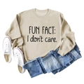 Flach liegendes beige Sweatshirt mit schwarzem Fun Fact I Don't Care Aufdruck - S / Sandfarben (Schwarze Schrift)