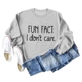 Flat lay of a grey crewneck sweatshirt featuring a Fun Fact print with blue jeans and sneakers - Grey (Black Font)