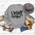 Flat lay of gray 'i smell snow' sweatshirt with winter accessories on white wood - S / Grey (Black Font)