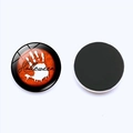 Detail view of round Halloween fridge magnet with orange glass front and black magnetic back - Halloween and Handprint Style (JY002045-8)