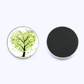 Close-up of circular glass fridge magnets with green Tree of Life pattern and black magnetic back - Heart Green Tree (JY001932-3)