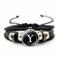 Detail of multi-layer woven leather bracelet featuring a silver letter Y glass pendant - Letter Y