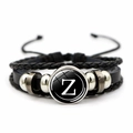 Detail of multi-layer leather bracelet featuring a vintage letter Z glass charm and beads - Letter Z