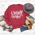 Flat lay of red crewneck sweatshirt with 'I smell Snow' text and autumn accessories - S / Red (White Font)