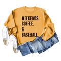Close-up of mustard yellow sweatshirt with Weekends Coffee & Baseball slogan print - Yellow