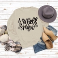 Flachbild des cremefarbenen Sweatshirts mit i smell snow Druck und Winterzubehör - S / Sandfarben (Schwarze Schrift)