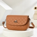 Detail of brown leather crossbody bag with embossed grid pattern and kangaroo logo - 22cm x 15cm x 7cm / Orange