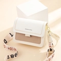 Minimalist beige crossbody bag with embroidered wide strap and flap closure design - Off White