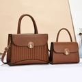 Striped brown pebbled leather tote set with gold semicircular locks and long straps - Earthy Yellow