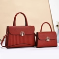 Red striped patchwork tote bag set with golden metal buckle and faux leather texture - Burgundy