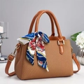 Brown woven texture handbag with colorful silk scarf handle and golden hardware - Earthy Yellow